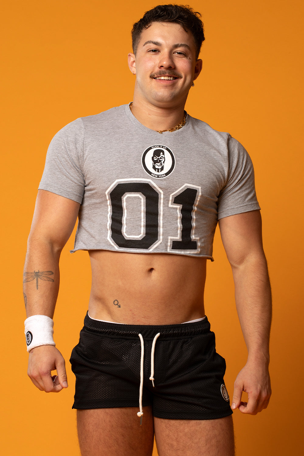 Slick It Up Football Cut Crop Top