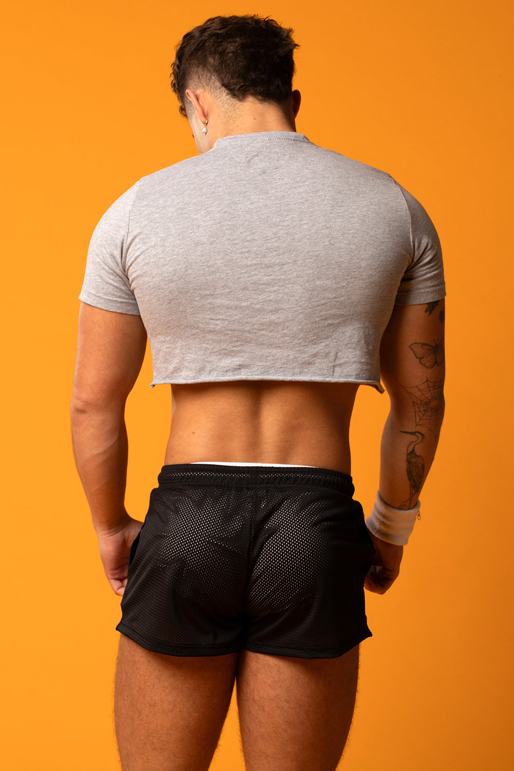 Slick It Up Football Cut Crop Top